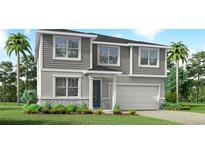 Charming two-story home features a two-car garage, neutral colors, and stone accents at 13240 Pergola Ave, Orlando, FL 32832