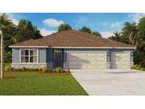 Charming single-story home featuring a two-car garage and manicured lawn with tropical landscaping at 1040 Morfontaine St, Daytona Beach, FL 32124