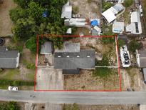 Aerial view of home and property, with lot lines in red at 1206 Olen Dr, Daytona Beach, FL 32117