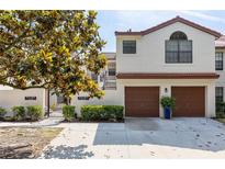 Charming townhome with a well-maintained exterior and two-car garage and gate at 520 Via Verona Ln # 202, Altamonte Springs, FL 32714
