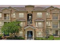 Stylish condominium building features a well-maintained exterior and appealing architectural details at 621 Terrace Ridge Cir # 621, Davenport, FL 33896