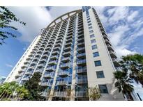 Modern high-rise condo building with balconies and a view of the city skyline at 155 S Court Ave # 2406, Orlando, FL 32801