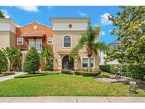 Charming two-story townhouse with well-manicured lawn and mature landscaping at 1745 Indiana Ave # J, Winter Park, FL 32789