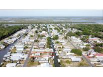 Gorgeous aerial view of a waterfront community with direct access to canals and wide open bays and ocean at 139 Randle Ave, Oak Hill, FL 32759