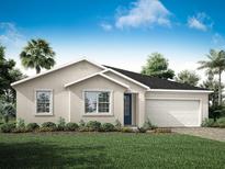 Inviting single-story home featuring a two-car garage, manicured lawn, and stucco facade at 2681 Ginseng Ivy St, Apopka, FL 32703