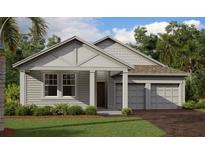 Charming one story home with a covered front porch, two-car garage, and well-maintained lawn at 30112 Misty Pines Rd, Mount Dora, FL 32757