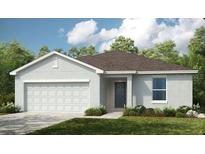 Charming single-story home featuring a two-car garage, neutral paint, and a well-maintained lawn at 531 Wayland Dr, Haines City, FL 33844