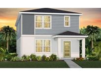 Charming two-story home with a well-manicured lawn and lush tropical landscaping at 7274 Summer Ivy Aly, Orlando, FL 32829