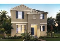Two-story home featuring neutral paint, a charming entry, and manicured landscaping at 11164 Hollow Bay Dr, Winter Garden, FL 34787