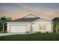 Charming single-Gathering home with a two-car garage and manicured lawn at 1524 Groveline Rd, St Cloud, FL 34771