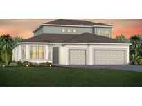 Charming two-story home featuring an attached two car garage, neutral color palette, and professionally landscaped lawn at 6035 Blue View Way, St Cloud, FL 34771
