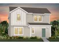 Charming two-story home with a welcoming porch and well-manicured landscaping at 5033 Starling Bird Ln, St Cloud, FL 34771