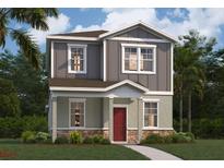 Charming two-story home featuring stone accents, neutral siding and inviting front porch at 502 Belmond Dr, Debary, FL 32713