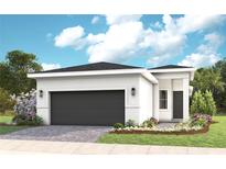 Charming single-story home with a modern design, landscaped yard, and a two-car garage at 1461 Santorini Way, Tavares, FL 32778