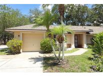 Charming single-story home with a well-maintained lawn and inviting curb appeal, offering a welcoming atmosphere at 4035 Palo Alto Ct, Orlando, FL 32817