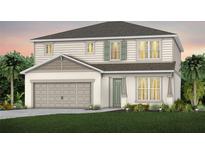 Charming two-story home with a gray roof, white siding, and a well-manicured lawn at 3091 Norcott Dr, Davenport, FL 33837