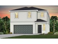 Charming two-story home featuring a modern garage door, lush landscaping, and classic architectural details at 3440 Haven Side Rd, Davenport, FL 33837
