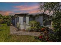 Charming home featuring a two-car garage, well-maintained landscaping, and inviting curb appeal at 532 Casanova Ct, Kissimmee, FL 34759