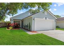 Charming single-story home with well-manicured lawn and inviting curb appeal at 202 Twisting Trl, Orlando, FL 32825