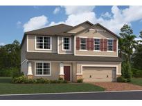 Inviting two-story home with a neutral color palette, red shutters, and an attached two-car garage at 1153 Basalt Ln, Sanford, FL 32771