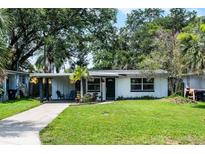 Charming single-story home with a well-manicured lawn and inviting curb appeal at 3474 Fairway Ln, Orlando, FL 32804