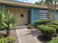 Charming home exterior featuring a well-maintained yard and inviting entrance at 4936 Tangerine Ave # 4936, Winter Park, FL 32792