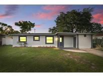 Charming single-story home featuring a well-maintained lawn and a freshly painted exterior at 3927 Citadel Dr, Orlando, FL 32839