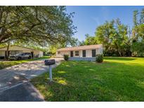 Charming single-story home featuring a well-maintained lawn and inviting curb appeal at 4226 Kelly Miller Ct, Orlando, FL 32811