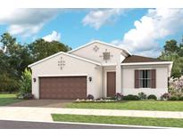 Inviting single-Gathering home with a two-car garage and a well-manicured lawn at 940 Club Cresswind Dr, Lady Lake, FL 32159