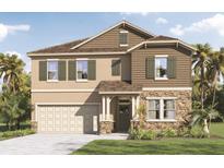 Charming two-story home boasting stone accents, a covered entryway, and a convenient two-car garage at 3334 Arch Ave, Ormond Beach, FL 32174