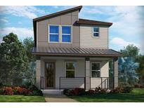 Modern two-story home featuring a covered porch, two-tone siding, and well-maintained landscaping at 14250 Braemar St, Winter Garden, FL 34787