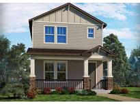 Charming two-story home featuring a welcoming front porch, stone accents, and beautifully landscaped front yard at 16526 Silver Brook Way, Winter Garden, FL 34787