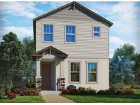 Charming two-story home featuring neutral siding, stone accents, a covered entry, and professionally landscaped front yard at 4537 Cross Prairie Pkwy, St Cloud, FL 34772