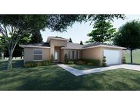 Charming single-story home with a well-maintained lawn and inviting curb appeal at 304 N Jungle Rd, Geneva, FL 32732