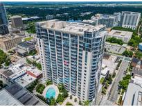 Stunning high-rise condo building featuring a pool and breathtaking city views from every floor at 155 S Court Ave # 2008, Orlando, FL 32801