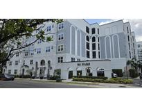 Beautiful building featuring an elegant entrance, and white and gray color scheme at 204 E South St # 4056, Orlando, FL 32801