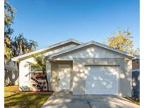 Charming single-story home with a well-maintained lawn and attached one car garage and neutral paint at 3347 Timberline W Rd, Winter Haven, FL 33880