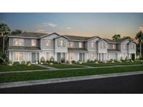 Charming townhome exterior featuring landscaped lawns, modern design, and a welcoming facade at 10160 Hadley St, Orlando, FL 32829