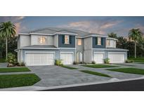 Charming townhome with manicured lawn, private driveways, and appealing two-story facade at 3610 Raindrop Way, Sanford, FL 32773