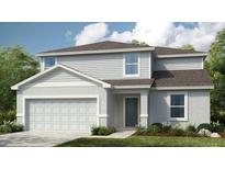 Charming two-story home with attached garage, landscaped yard and neutral color palette at 4724 Cloister St, Kissimmee, FL 34758