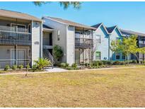 Condo exterior features multiple units, well-maintained landscaping, and ample open space at 3772 Idlebrook Cir # 100, Casselberry, FL 32707