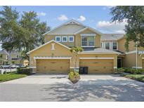 Inviting two-story townhome with double garage and well-maintained landscaping at 14025 Oasis Springs Ln # 901, Windermere, FL 34786