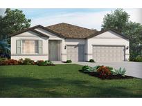 Charming single-story home featuring a two-car garage, neutral color palette, and well-maintained landscaping at 2364 Citrus Bloom Dr, Bartow, FL 33830