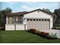 Charming single-story home features a two car garage, neutral color palette and well-manicured lawn at 658 Pennywort St, Lake Alfred, FL 33850