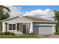 Charming single-story home featuring a quaint front porch and a well-manicured lawn at 4262 Eastminster Rd, Davenport, FL 33837