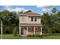 Charming two-story home with a covered front porch and lush, green landscaping at 2159 Stake Out Way, Apopka, FL 32703