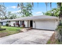 Charming one-story home with a well-maintained lawn and inviting curb appeal at 2666 Derbyshire Rd, Maitland, FL 32751