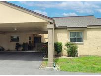Inviting one-story villa with covered parking and meticulously maintained landscaping at 314 Windmeadows St # 314, Altamonte Springs, FL 32701