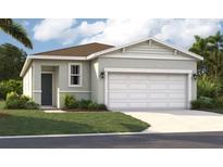 Charming single-story home with a two-car garage, well-manicured lawn, and neutral color palette at 4140 Lavender Ct, Lake Hamilton, FL 33851