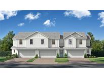 Charming new construction townhomes featuring light gray paint, integrated garages, and lovely curb appeal at 6466 Horseshoe Lane Way, St Cloud, FL 34773